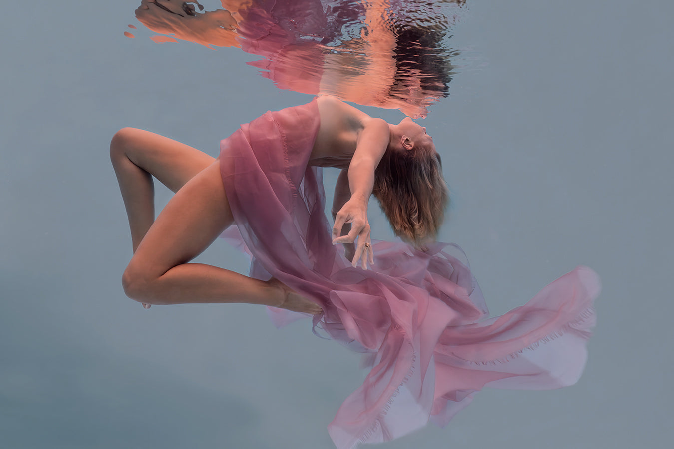 Athena by Liesel.Art: A captivating fine art print featuring a beautiful woman dancing on the surface of the water and her reflection looking back at her