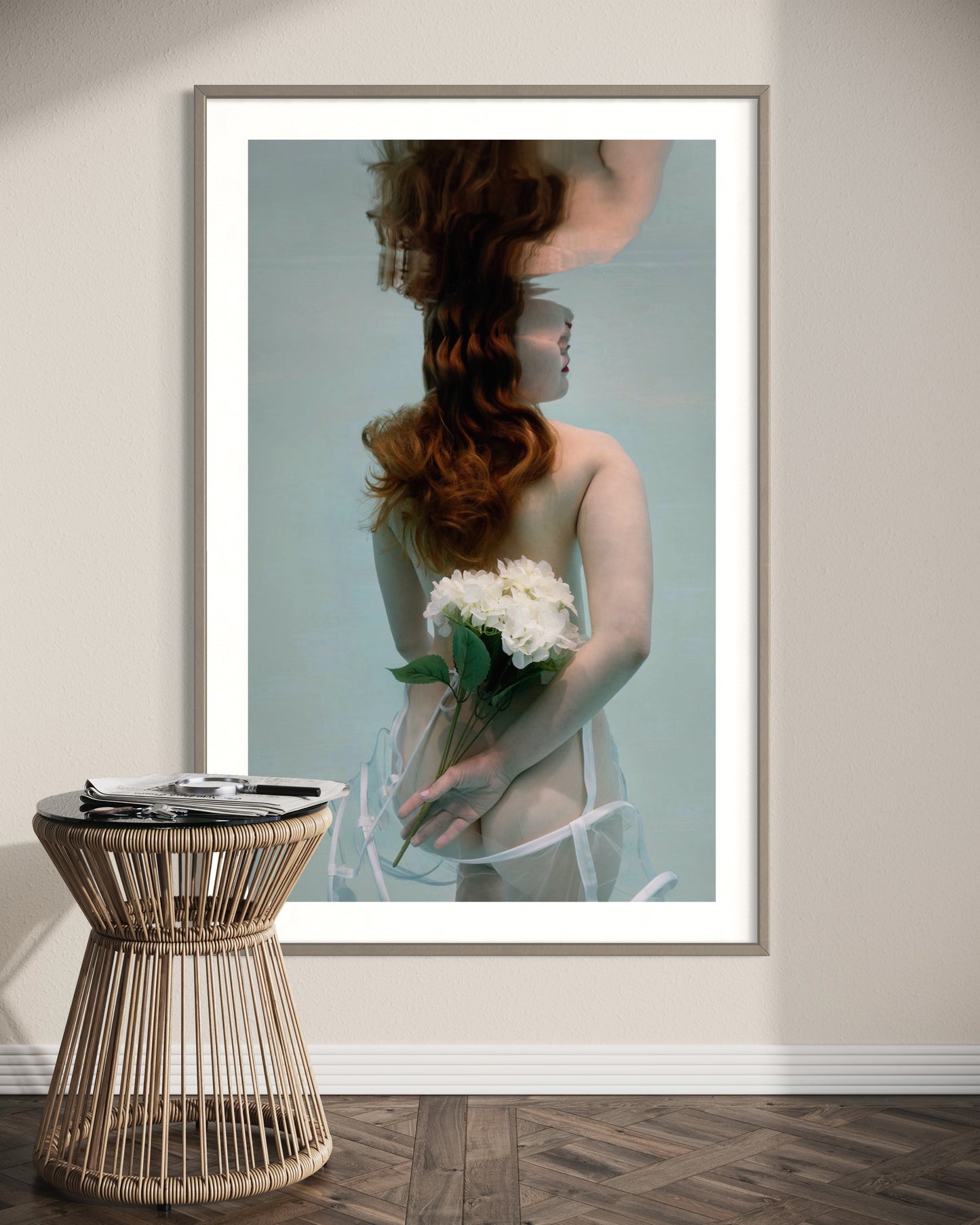 "Blanc by Liesel.Art: A serene image of a beautiful girl floating in water, gracefully holding white flowers, creating a tranquil and enchanting scene