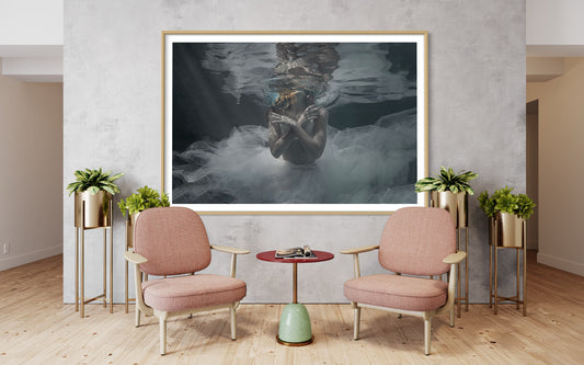 "Isabella by Liesel.Art: A breathtaking image of a beautiful ballerina floating in the water, adorned in a delicate white tutu, capturing the grace and elegance of dance in a serene aquatic setting."