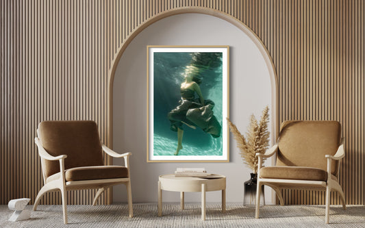 Lavinia the enchanting beauty, gracefully floating in emerald waters wearing a mesmerising bronze satin fabric - a captivating artwork by Liesel.Art."